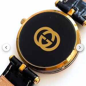 Gucci Black and Gold Emblem Watch